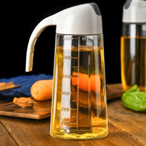 Glass oil pot with handle - Image 1