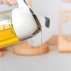 Glass oil pot with handle - Image 4